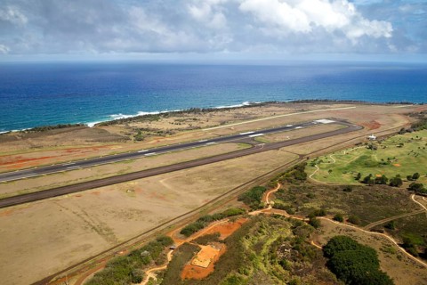 Aerial view over the airport of Lihue, Kauai, Hawaii, USA with view over the runway to the