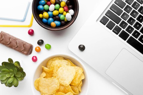 Bowl with unhealthy snacks