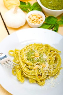 Italian traditional basil pesto pasta ingredients parmesan cheese pine nuts extra virgin olive oil