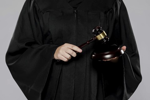 Front view female judge with gavel. Resolution and high quality beautiful photo