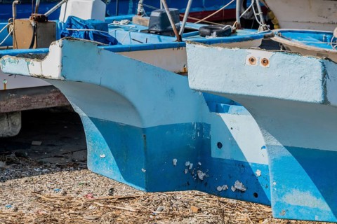 Closeup of fiberglass hull of scrapped fishing trawler in Pyeongtaek, South Korea, Asia