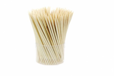 Bunch of wooden toothpicks isolated on white
