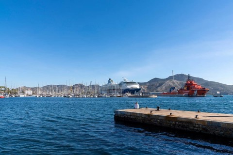 Cartagena, Spain - 29 December, 2021: the Cartagena marina and port with many boats and a cruise