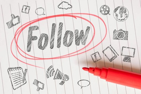Follow social media sketch on linear paper with a red brush