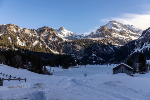 Frozen Lake Lauenen with a view of the Wildhorn and Arpelistock, Lauenen b. Gstaad, Bern,