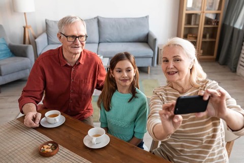 Grandparents girl taking selfie