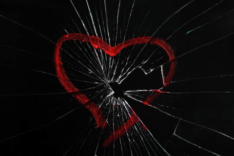 Broken glass with drawn heart