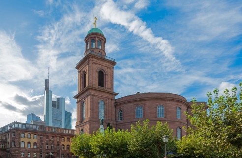 Paulskirche church in Frankfurt Germany with a skyscraper in the background