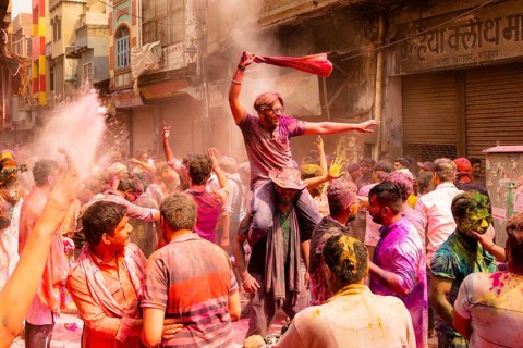 Holi Festival of Colors in the streets of Mathura, India, Asia