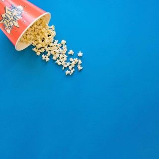 Popcorn blue background with space right