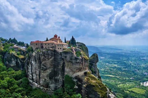 Clifftop Eastern Orthodox nunnery of St Stephen or Agios Stefanos in famous Meteora valley, Greece,