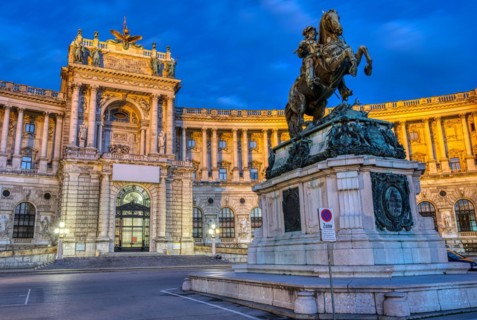 The Prince Eugene statue with part of the Hofburg Imperial Palace in Vienna by night