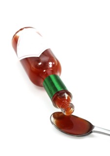 Tabasco, Hot Pepper Sauce against White Background