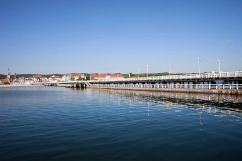 Pier in resort town of Sopot in Poland, Baltic Sea bay, popular tourist vacation destination