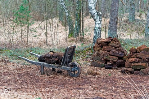 Peat bales on a wheelbarrow, Resse, Lower Saxony