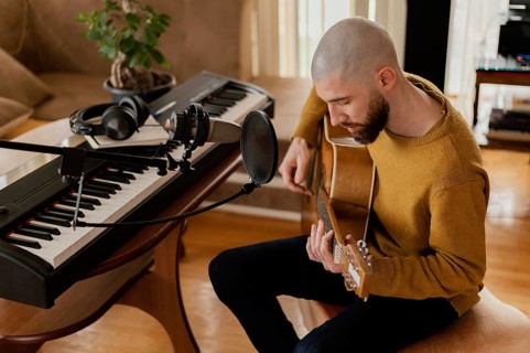 Creative musician practicing indoors