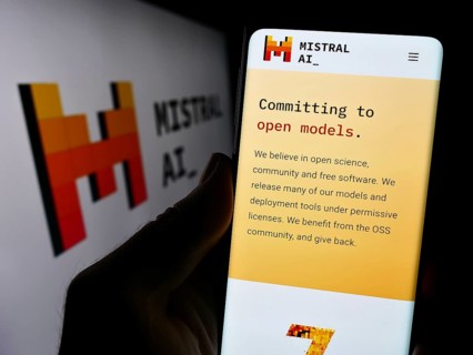 Stuttgart, Germany, 11-27-2023: Person holding cellphone with webpage of French artificial