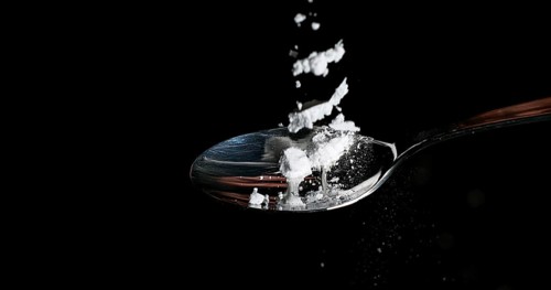 Drug, Cocaine in spoon against black background