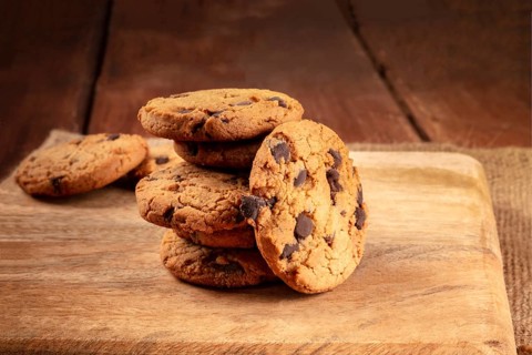 Chocolate chip cookies, gluten free, a close-up of a stack on a dark rustic background