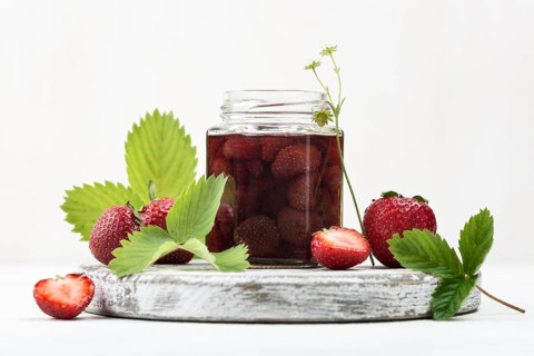 Arrangement with strawberries jar