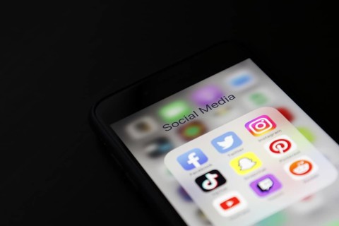 Social media icon, detailed view of a smartphone with social media apps, Facebook, Twitter,