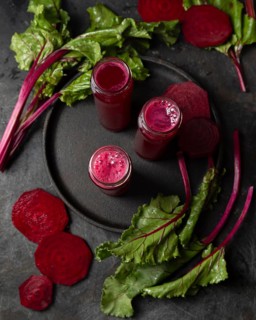 Top view beet juice bottles. Beautiful photo