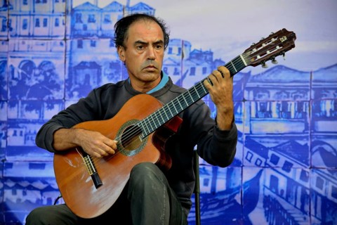 Fado musician performing at a concert in Castelo de Sao Jorge Castle, Alfama, Lisbon, Lisbon