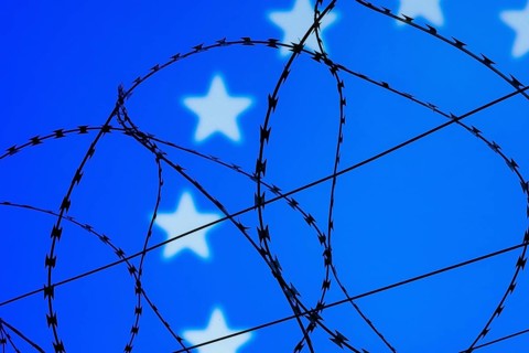 Symbolic image, migration, defence against refugees wanting to enter the EU, barbed wire overarches