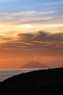 Sunset over Stromboli Volcano from Nicotera, Mount Stromboli, Tyrrhenian Sea, Stromboli, Italy,