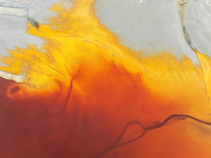 Waste pond in the mineral-rich area of the Rio Tinto mines. The colour is caused by oxidised iron