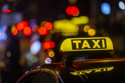 Illuminated taxi sign in the evening, symbolic photo, Stuttgart, Baden-Württemberg, Germany, Europe