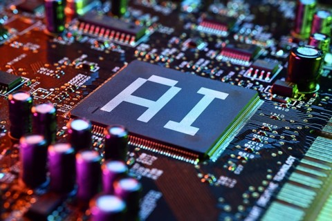 Computer chip labelled AI, photomontage