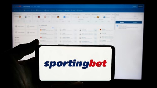 Stuttgart, Germany, 06-06-2024: Person holding cellphone with logo of British sports betting