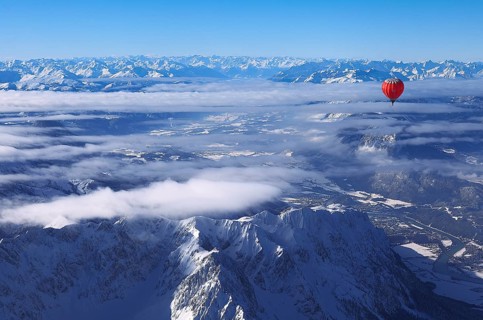 Hot-air balloon flying over Wilder Kaiser Mountain, Kössen, Tyrol, Austria, Europe