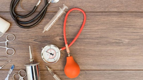 Sphygmomanometer stethoscope medical equipment s wooden desk