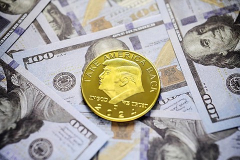 Donald Trump coin as 47th President of the USA on dollar bills, symbolic photo of presidency and US