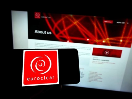 Stuttgart, Germany, 01-06-2022: Person holding mobile phone with logo of Belgian financial company