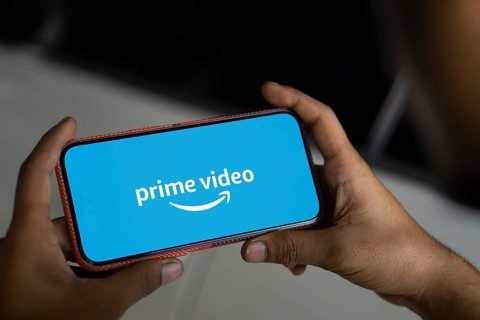 Amazon prime video logo is displayed on smartphone.