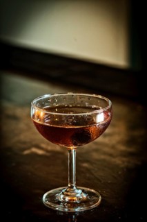 Manhattan classic whisky cocktail drink in modern bar