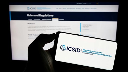 Stuttgart, Germany, 08-05-2023: Person holding cellphone with logo of World Bank's institution