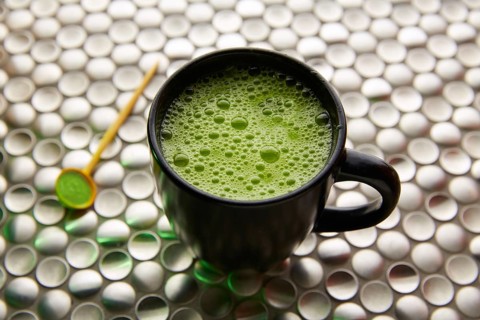 Matcha green tea from Japan on modern stainless steel background