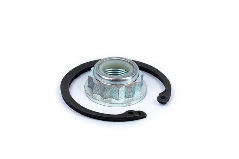 Close-up metal nut with polymer lock and steel locking clip on a white isolated background. Spare