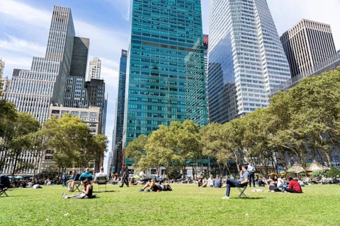 New York, United States of America, September 20, 2019: People on the grass lawn in Bryant Park in