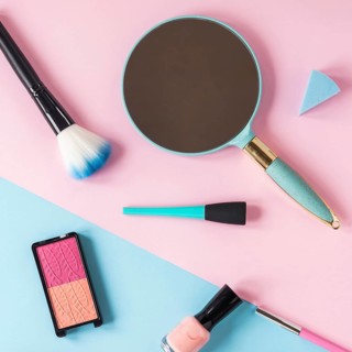 Mirror with eye shadows powder brush table