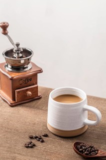 High angle coffee grinder with mug coffee beans
