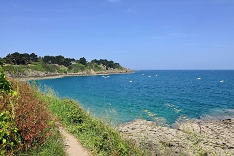 Coastal hiking trail on the Emerald Coast near Saint-Lunaire, Ille-et-Vilaine, Brittany, France,