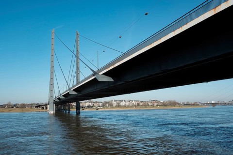 View over the Rhine with Rheinkniebrücke, behind it Oberkassel, Düsseldorf, Germany, Europe