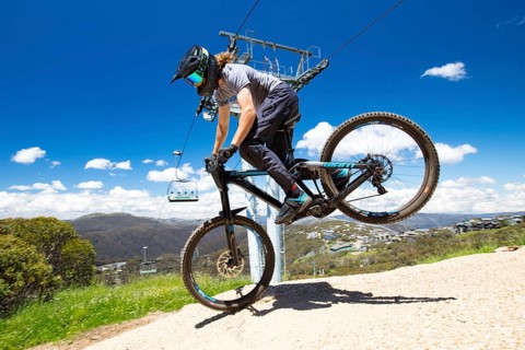 Mt Buller, Australia, January 2 2018: Downhill mountain bike riders attempt the ABOM and