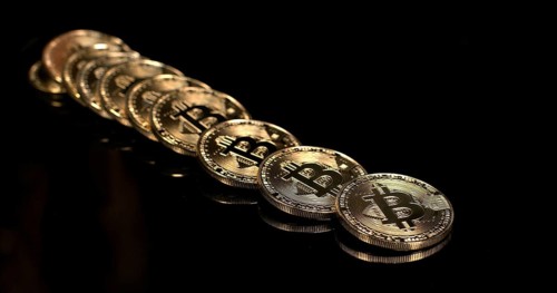 Bitcoins on Black Background