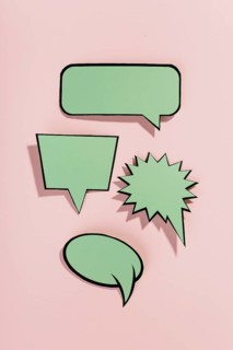 Green speech bubbles with black border pink background